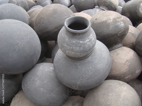 water clay pots to keep water cold.