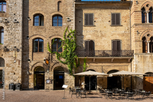 Retro romantic restaurant, cafe in a small Italian town. Vintage Italy, outdoor trattoria