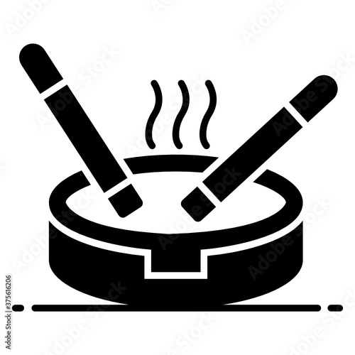 
Cigarettes with ashtray showing concept of smoking in icon
