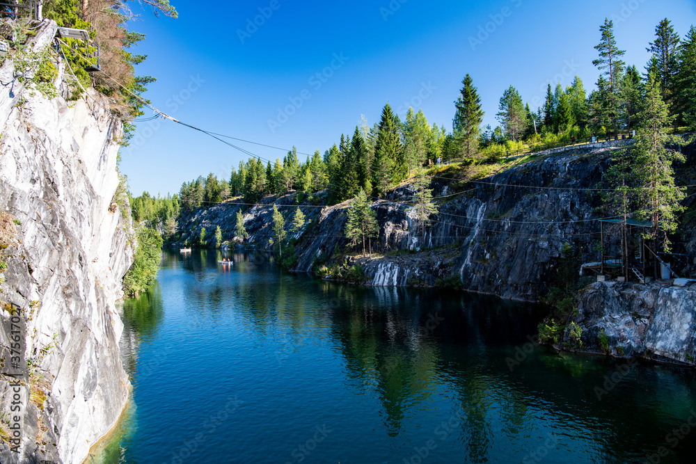 mountain lake with clear green water in granite and marble rocks in a natural monument mountain lake with clear green water in granite and marble rocks in a natural monument