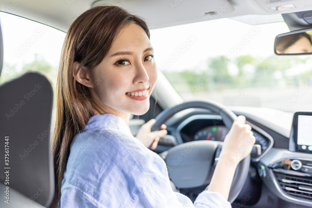 Asian female driver smile