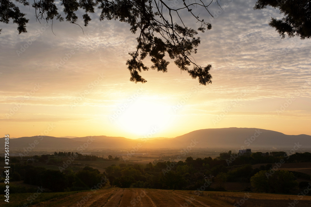 Last sun rays of the day on hills around Perugia in Umbria Last sun rays of the day on hills around Perugia in Umbria