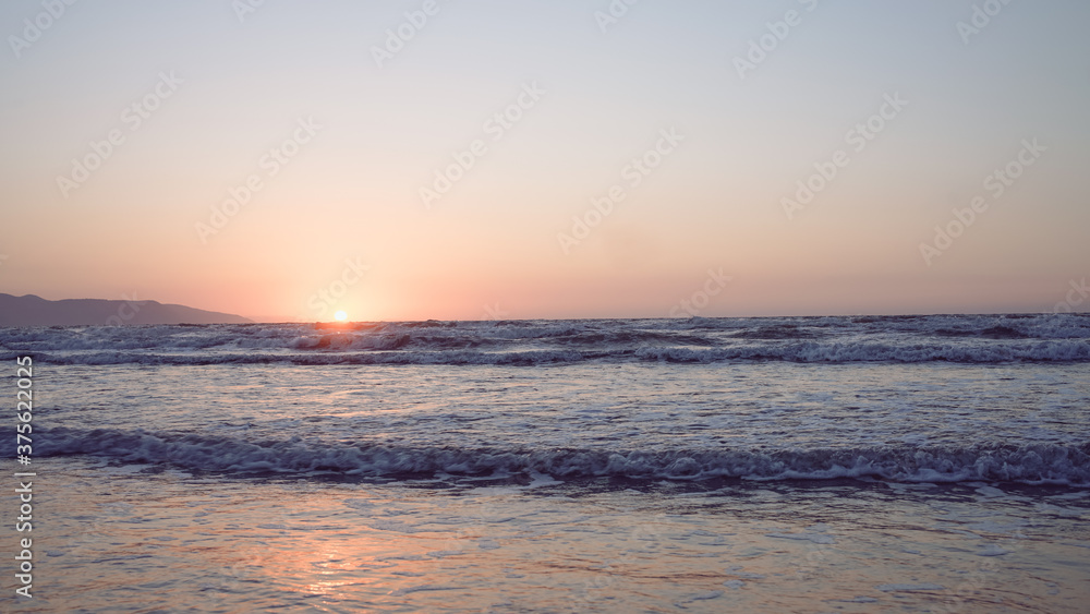 scenery seascape in early morning with bright sunlight in sunrise