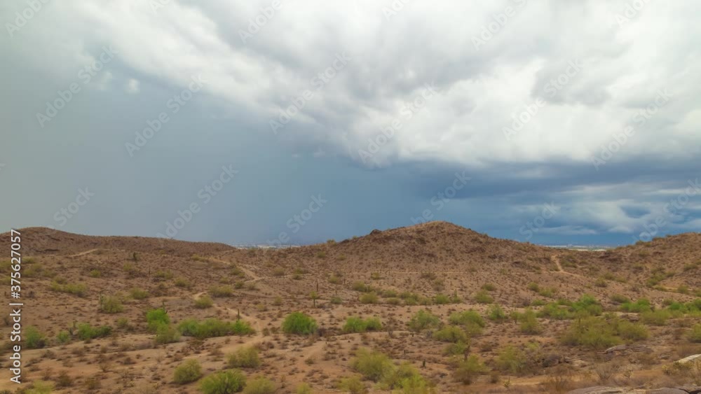 Storm and rain clouds over the mountains, time lapse. South Mountains, Phoenix, Arizona, USA Storm and rain clouds over the mountains, time lapse. South Mountains, Phoenix, Arizona, USA