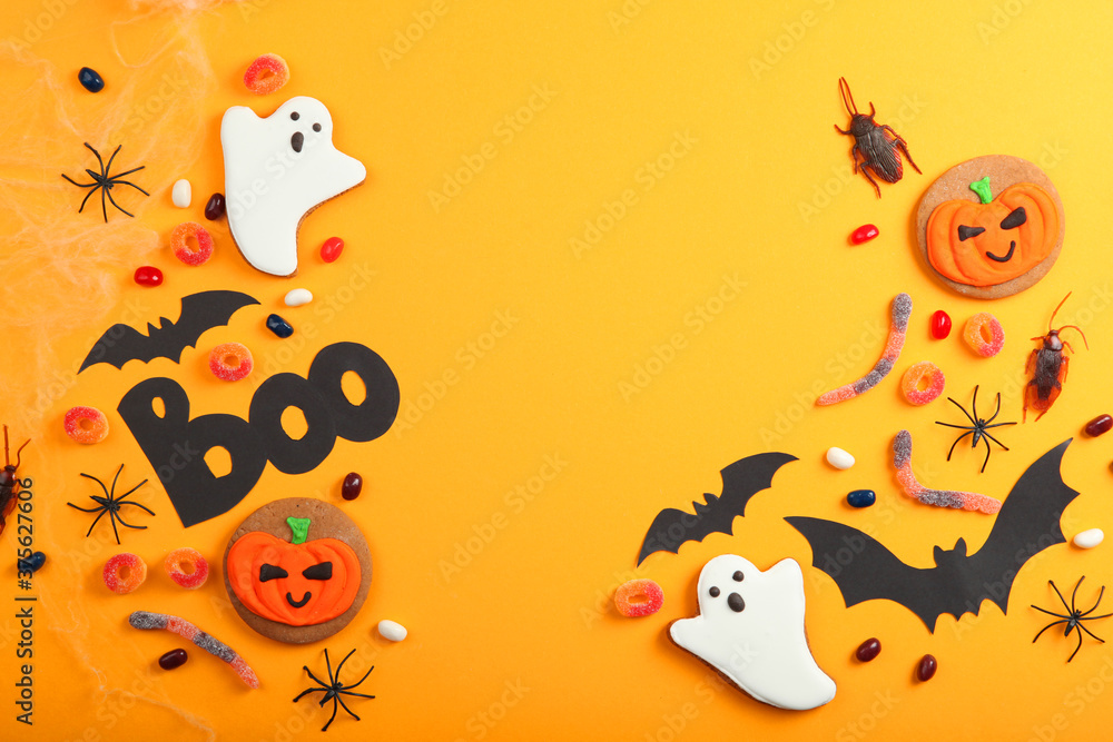 Halloween background with gingerbread and other sweets top view with place for text Halloween background with gingerbread and other sweets top view with place for text