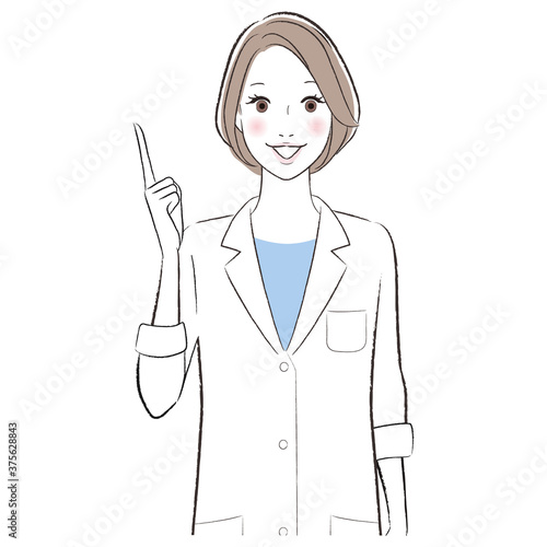 A woman doctor smiling and introducing something