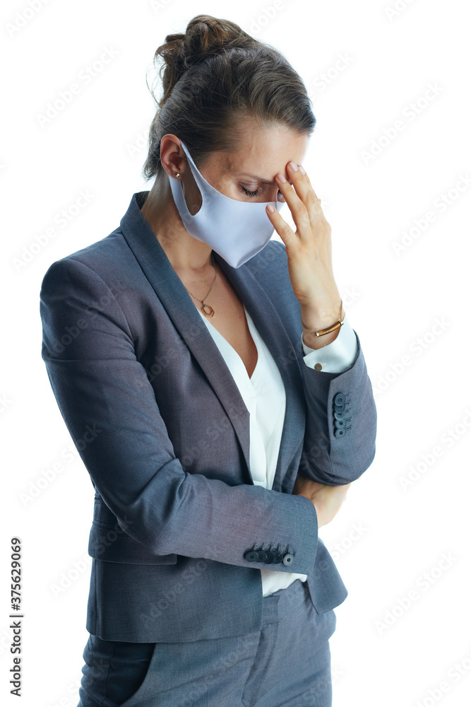 stressed 40 years old business woman in grey suit on stressed 40 years old business woman in grey suit on