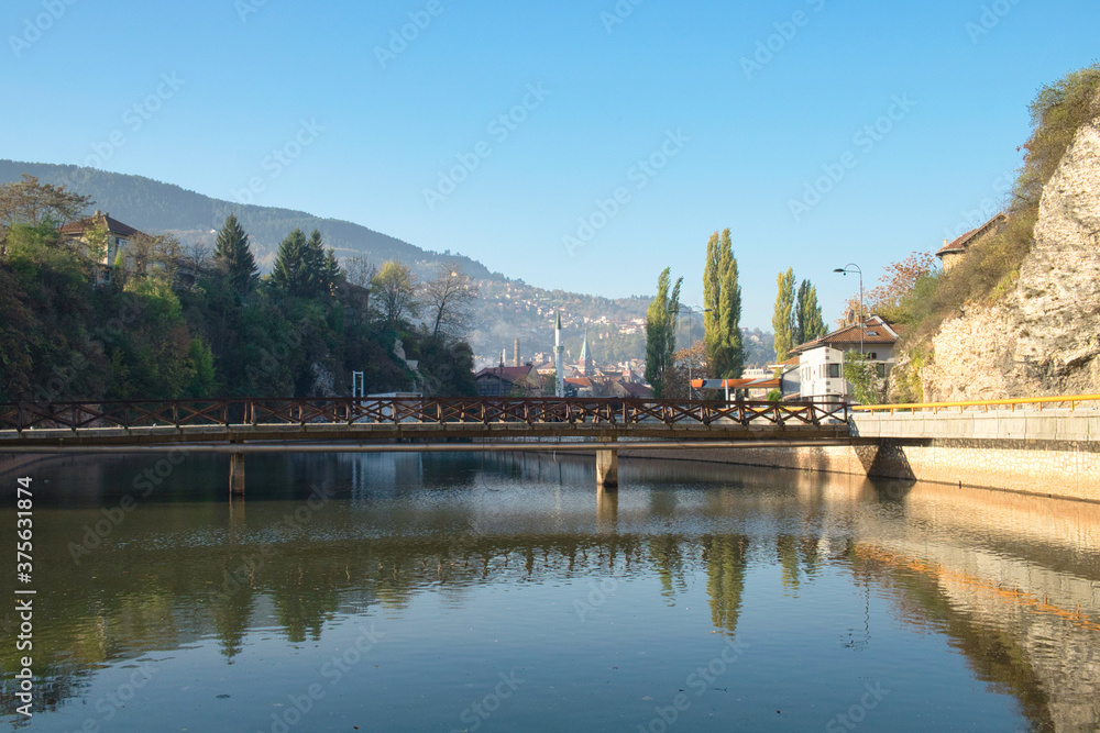 Sunny autumn morning on Miljacka river in Sarajevo, Bosnia and Herzegovina