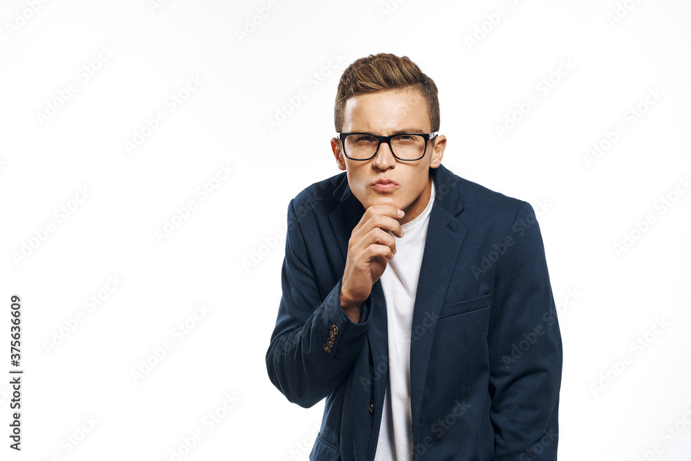 Business man in a jacket with glasses emotions official manager light background studio Business man in a jacket with glasses emotions official manager light background studio