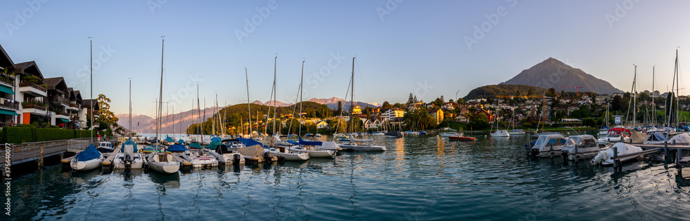 Harbor of Spiez, lake Thun, Switzerland, with boats (Panoramic view)