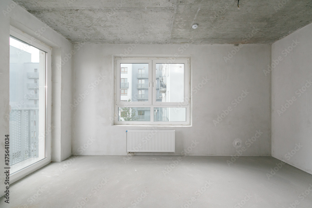 Fototapeta premium interior of the apartment without decoration in gray colors
