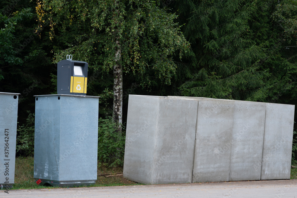New underground garbage recycling containers waiting to be installed.