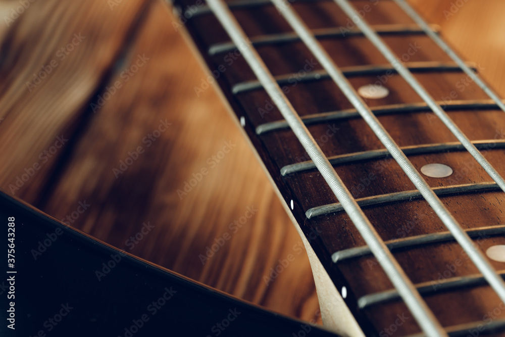 Fototapeta premium Close up photo of electric guitar fingerboard
