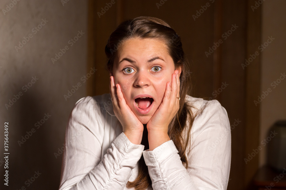 Young beautiful girl is in shock Young beautiful girl is in shock