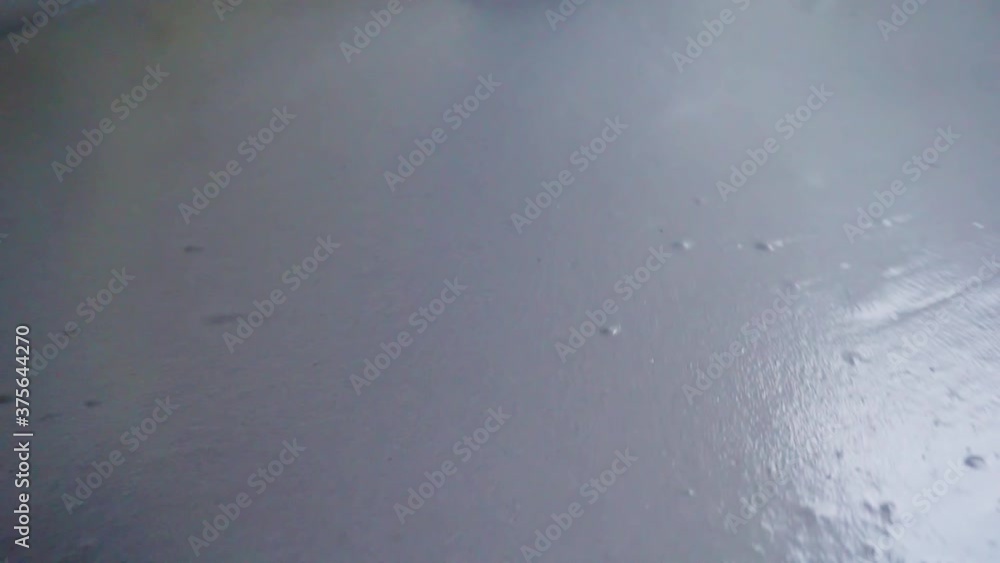 filling the surface with a special liquid for leveling the floor. filling the surface with a special liquid for leveling the floor.