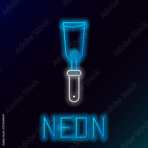 Glowing neon line Putty knife icon isolated on black background. Spatula repair tool. Spackling or paint instruments. Colorful outline concept. Vector.