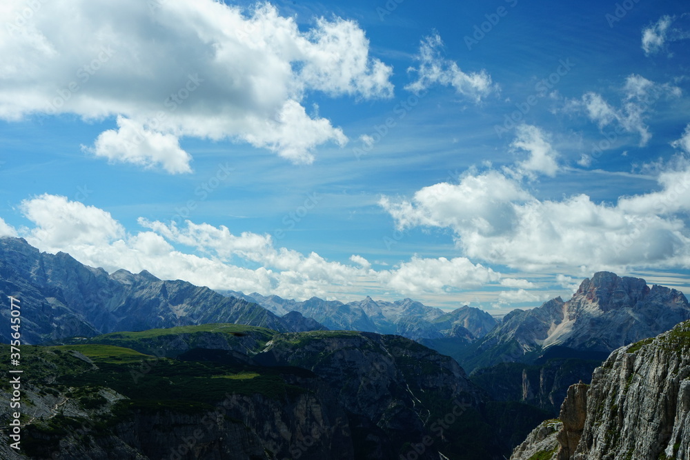 Fototapeta premium Mountain range of Belluno Alps from Three Peaks of Lavaredo hike on a summer day, Sudtirol, Trentino Alto Adige, Italy, Dolomites, Unesco
