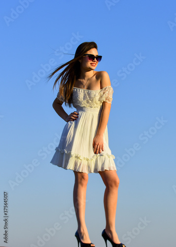 Looking trendy. being in romantic mood. youth beauty. Beautiful sexy young woman brunette hair. summer holiday and vacation. time to relax. free and happy. carefree girl look on sun. Fashion style