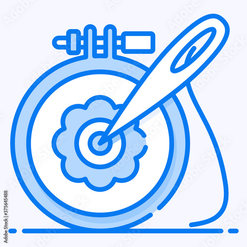 
Needle with thread on a piece of cloth, icon of needle work
