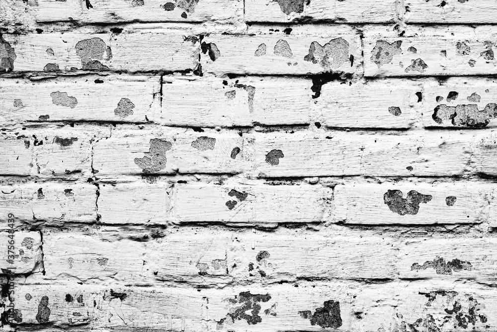 Obraz premium Texture of a concrete wall with cracks and scratches which can be used as a background