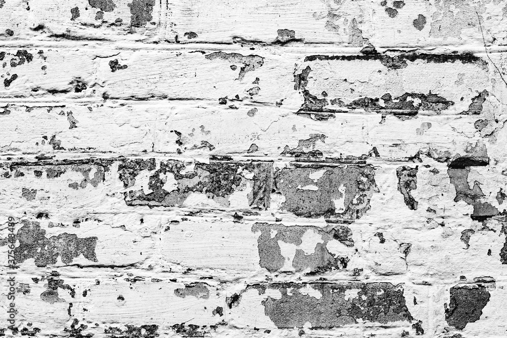 Texture of a concrete wall with cracks and scratches which can be used as a background Texture of a concrete wall with cracks and scratches which can be used as a background