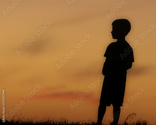 Families and children in the shadow and siloette of the sunset
