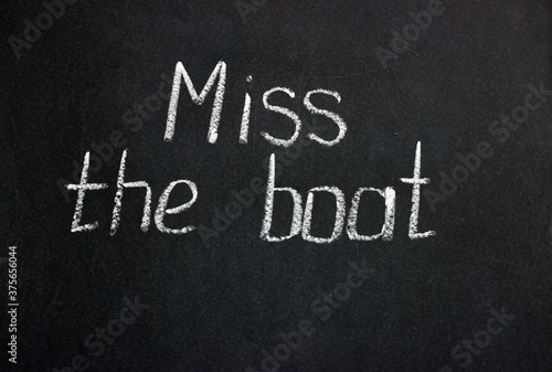 
Chalkboard lettering Miss the boat. Common phrase in English