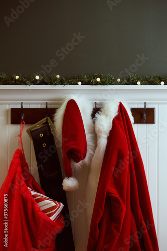 Christmas: Santa's Stuff Hanging In Hallway With Present Sack photo