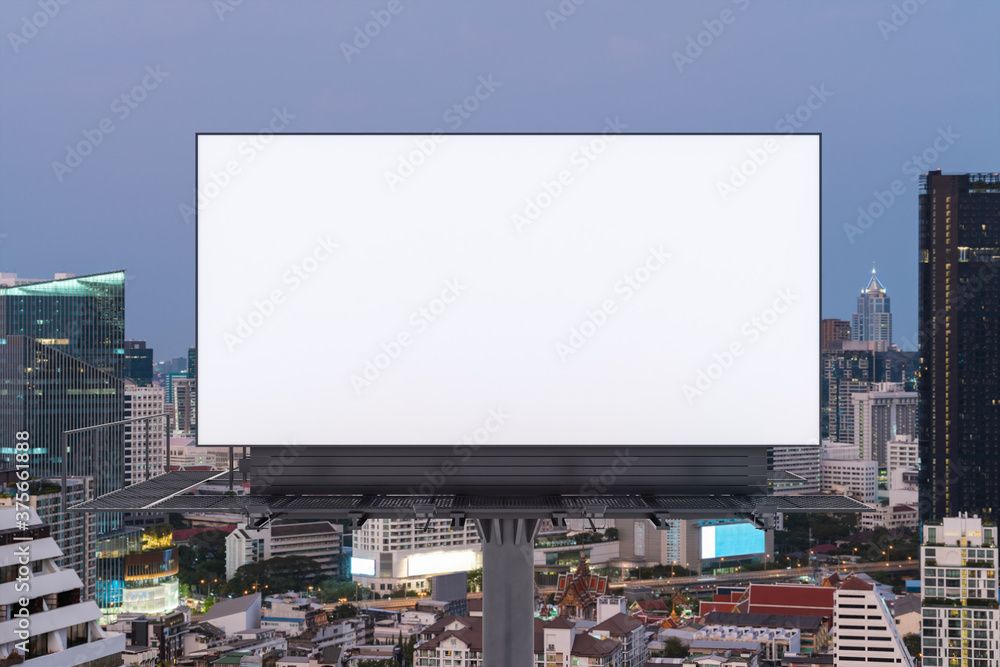 Blank white road billboard with Bangkok cityscape background at sunset. Street advertising poster, mock up, 3D rendering. Front view. The concept of marketing communication to promote or sell idea. Blank white road billboard with Bangkok cityscape background at sunset. Street advertising poster, mock up, 3D rendering. Front view. The concept of marketing communication to promote or sell idea.