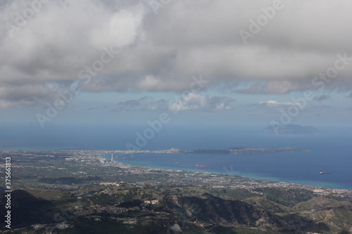 Clouds over the city, large view on Millazo and the Aeolian Islands