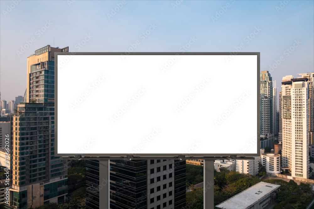 Blank white road billboard with Bangkok cityscape background at sunset. Street advertising poster, mock up, 3D rendering. Front view. The concept of marketing communication to promote or sell idea. Blank white road billboard with Bangkok cityscape background at sunset. Street advertising poster, mock up, 3D rendering. Front view. The concept of marketing communication to promote or sell idea.