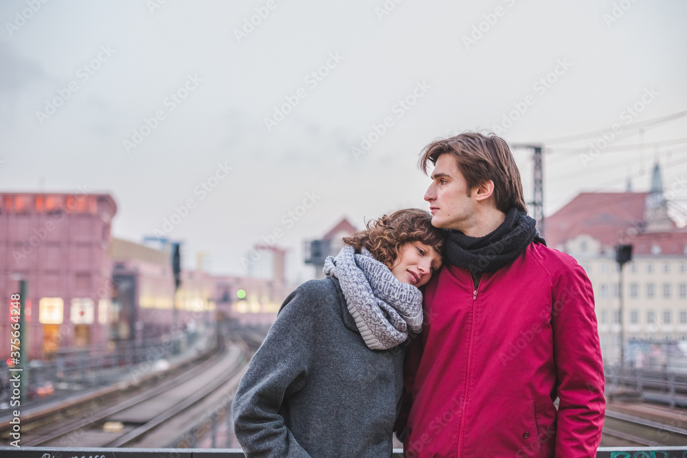 Young couple at the train station Young couple at the train station