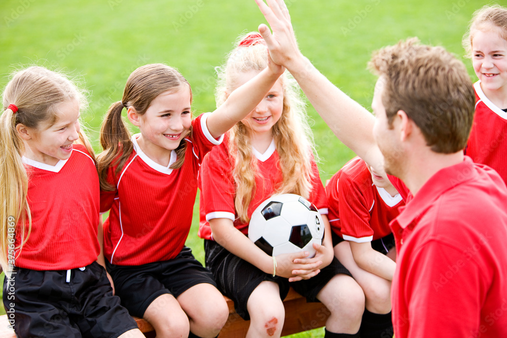 Soccer: Coach Gives Player a High Five Soccer: Coach Gives Player a High Five