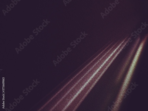 rays of light against textured wall