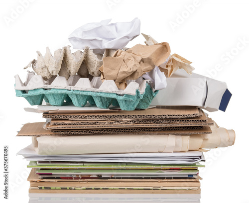 Recycling concept. Recyclable cardboard and paper isolated on white