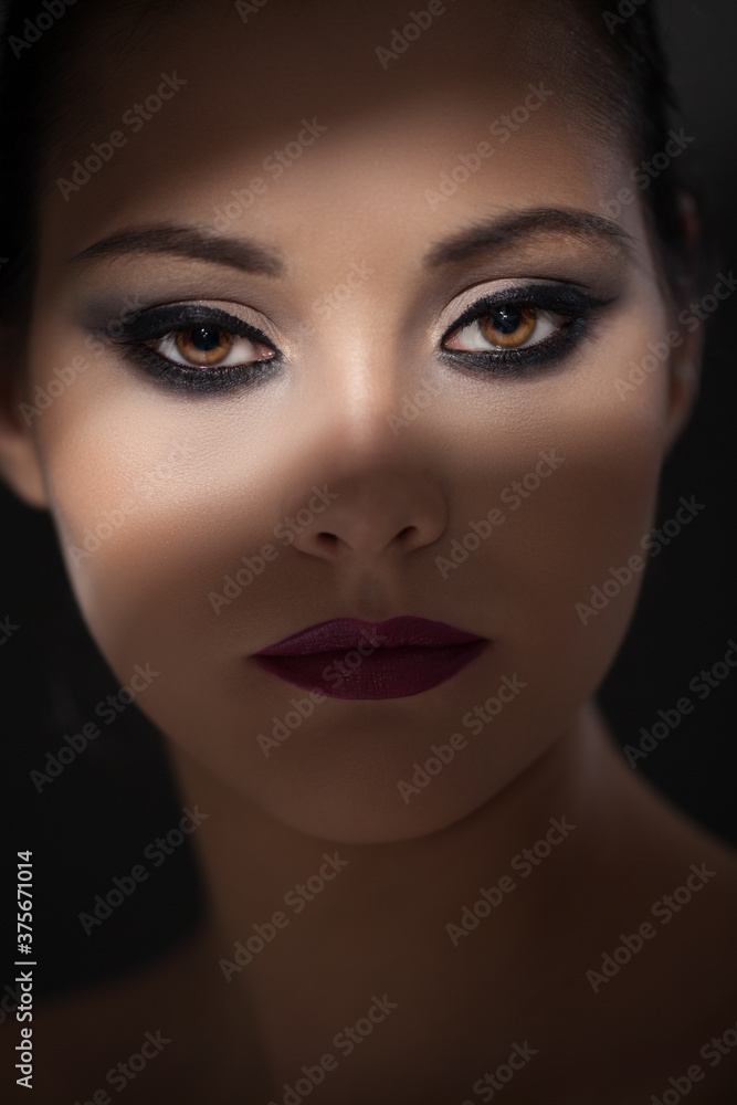 Close Up of Woman's Face Lit by Sunbeam Close Up of Woman's Face Lit by Sunbeam