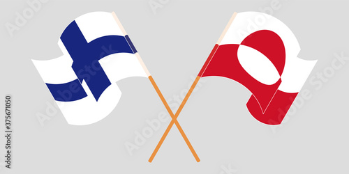 Crossed and waving flags of Greenland and Finland