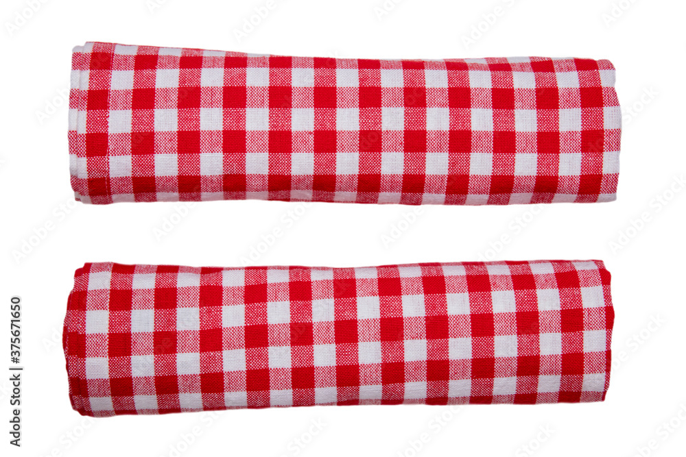 Rolled towels isolated. Close-up of red and white checkered napkin or picnic tablecloth texture isolated on a white background. Kitchen towel. Rolled towels isolated. Close-up of red and white checkered napkin or picnic tablecloth texture isolated on a white background. Kitchen towel.