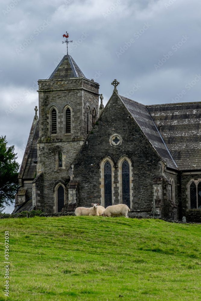 Old british church on the green pasture