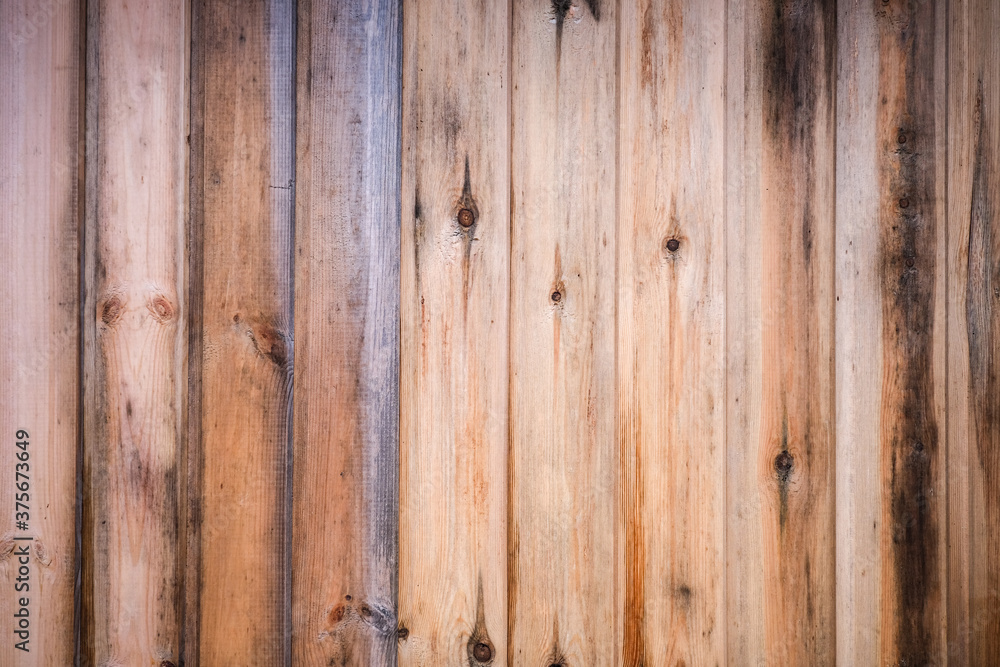 Aged unpainted wooden plank background, rot and mold on surface Aged unpainted wooden plank background, rot and mold on surface