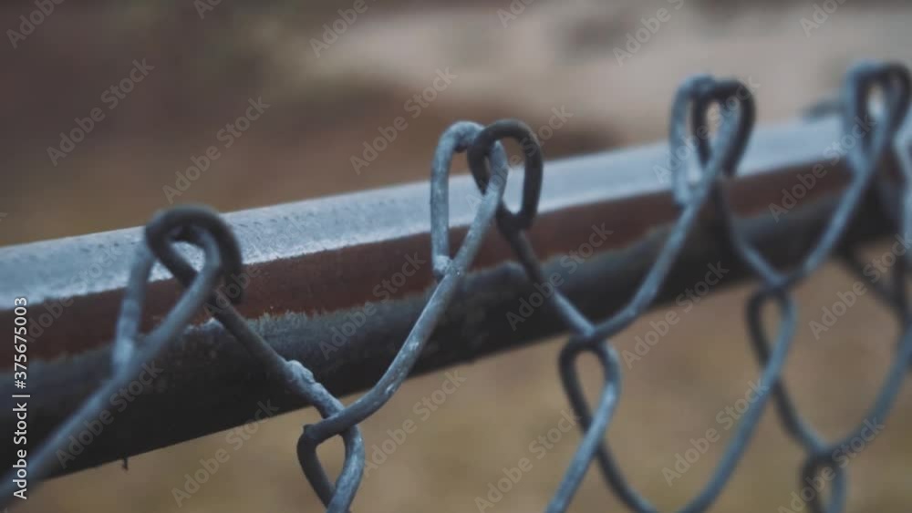 Slow motion clip of a chain link fence Slow motion clip of a chain link fence