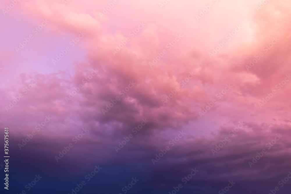 Obraz premium Cloudy sky in orange light.