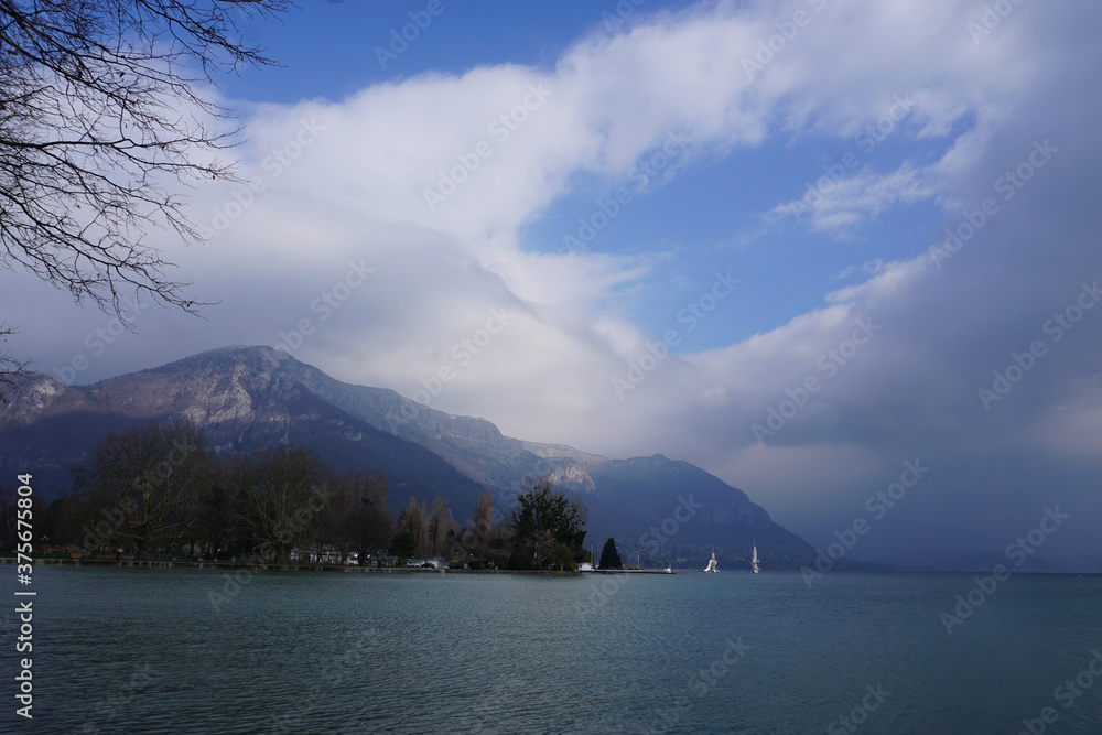 annecy lake, france in the mountains on a stormy day annecy lake, france in the mountains on a stormy day