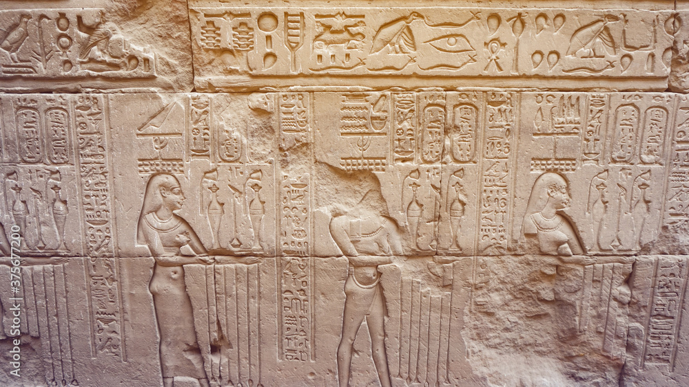 Egypt Hieroglyphic god face got destroyed at Edfu Horus temple feature wall