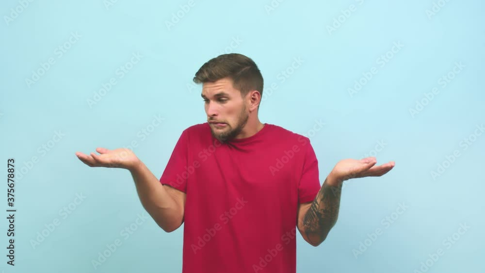 Young caucasian handsome man confused and doubtful, decide between two options, concept of indecision