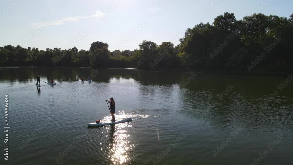Water rides on sup boarde .