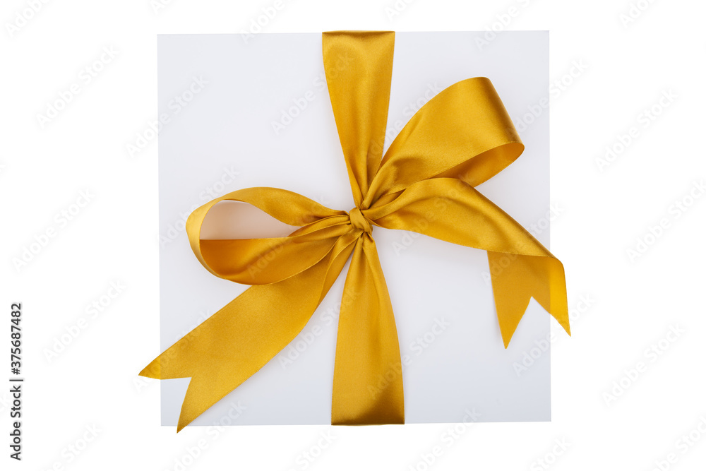 White gift box with yellow ribbon on white background. Top view. White gift box with yellow ribbon on white background. Top view.