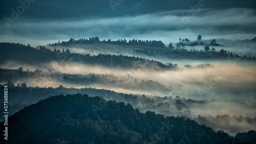 Fototapeta Naklejka Na Ścianę i Meble -  Sunrise over the mountain forest. Bieszczady National Park. Carpathian Mountains. Poland.