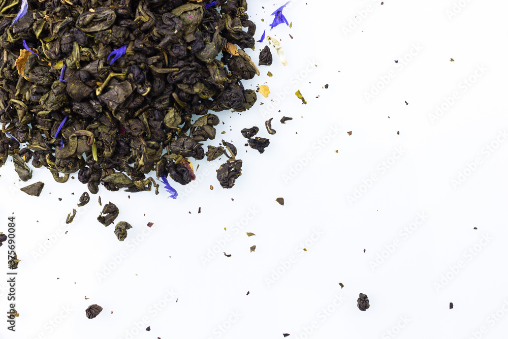 green tea leaves on white background green tea leaves on white background