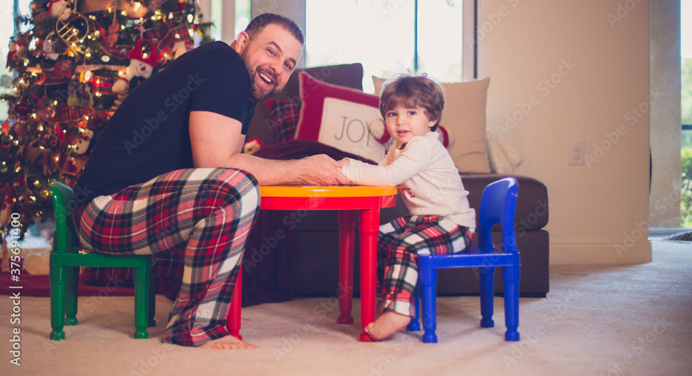 Boy playing with his father dada 